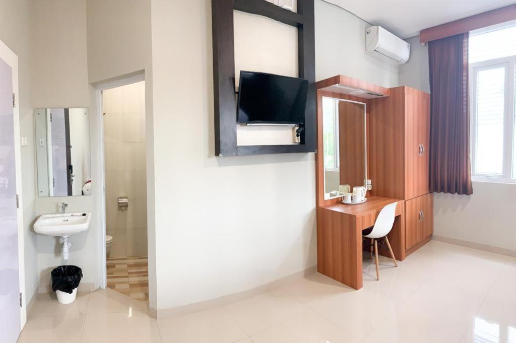 Oyo 2816 Privato Suite Kembaran Exterior foto